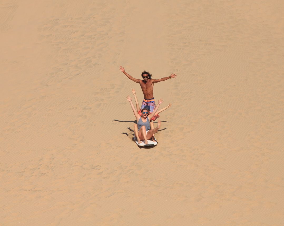 Sitting on the crest of the dune at golden hour